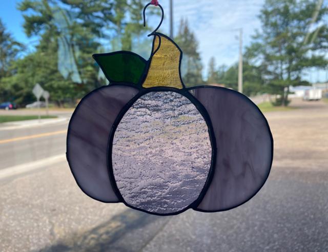 Stained glass pieces from Zodiac Stained Glass in autumn colors